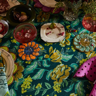 closer look of table margot table cloth in forest top view with glassware