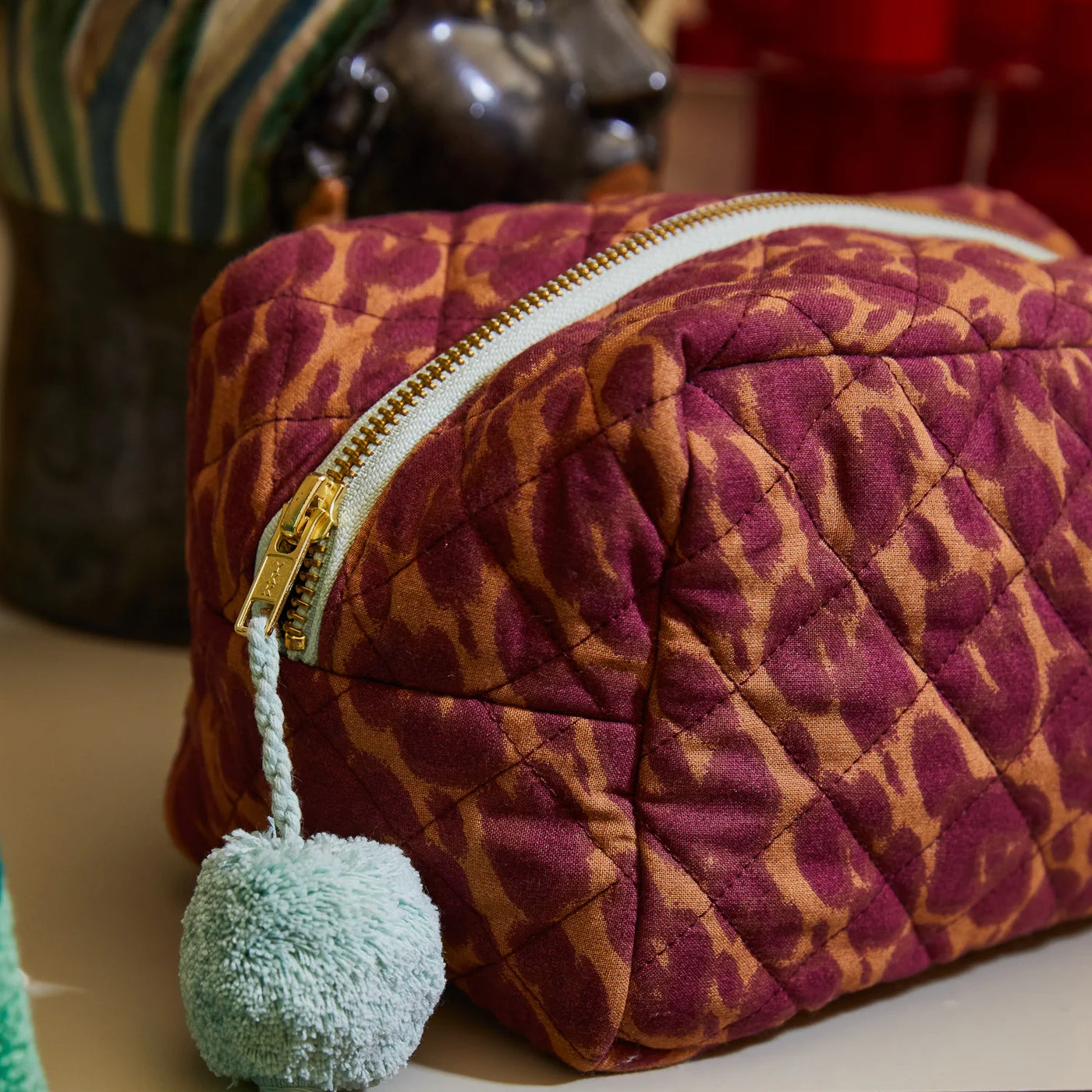 closer look to Odette Beauty Bag tussel