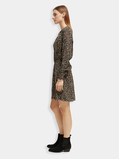 woman wearing Elasticated Waist Mini Dress - Creatures Print side view