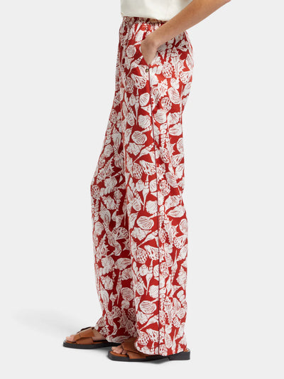Woman wearing Gia Shell Batik Printed Pants side view