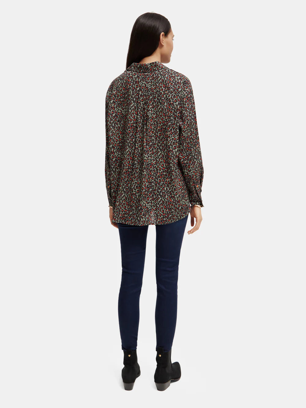 woman wearingOversized Print Shirt - Creatures Print and denim jeans back view