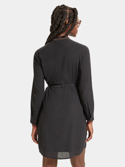 woman wearing Pop Over Shirt Mini Dress back view