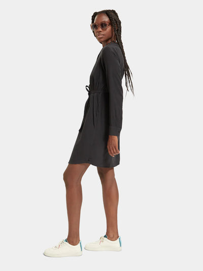 woman wearing Pop Over Shirt Mini Dress back view