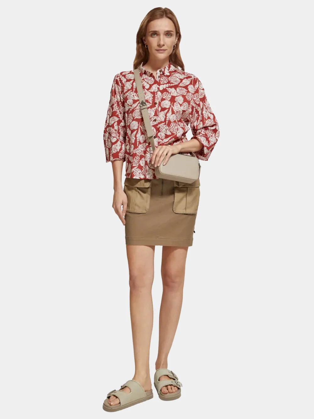 man wearing Printed Balloon Sleeve Shirt - Shell Batik and brown mini skirt front view