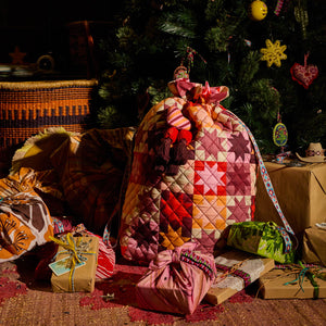 sage-x-clare-matilda-santa-sack-poppy